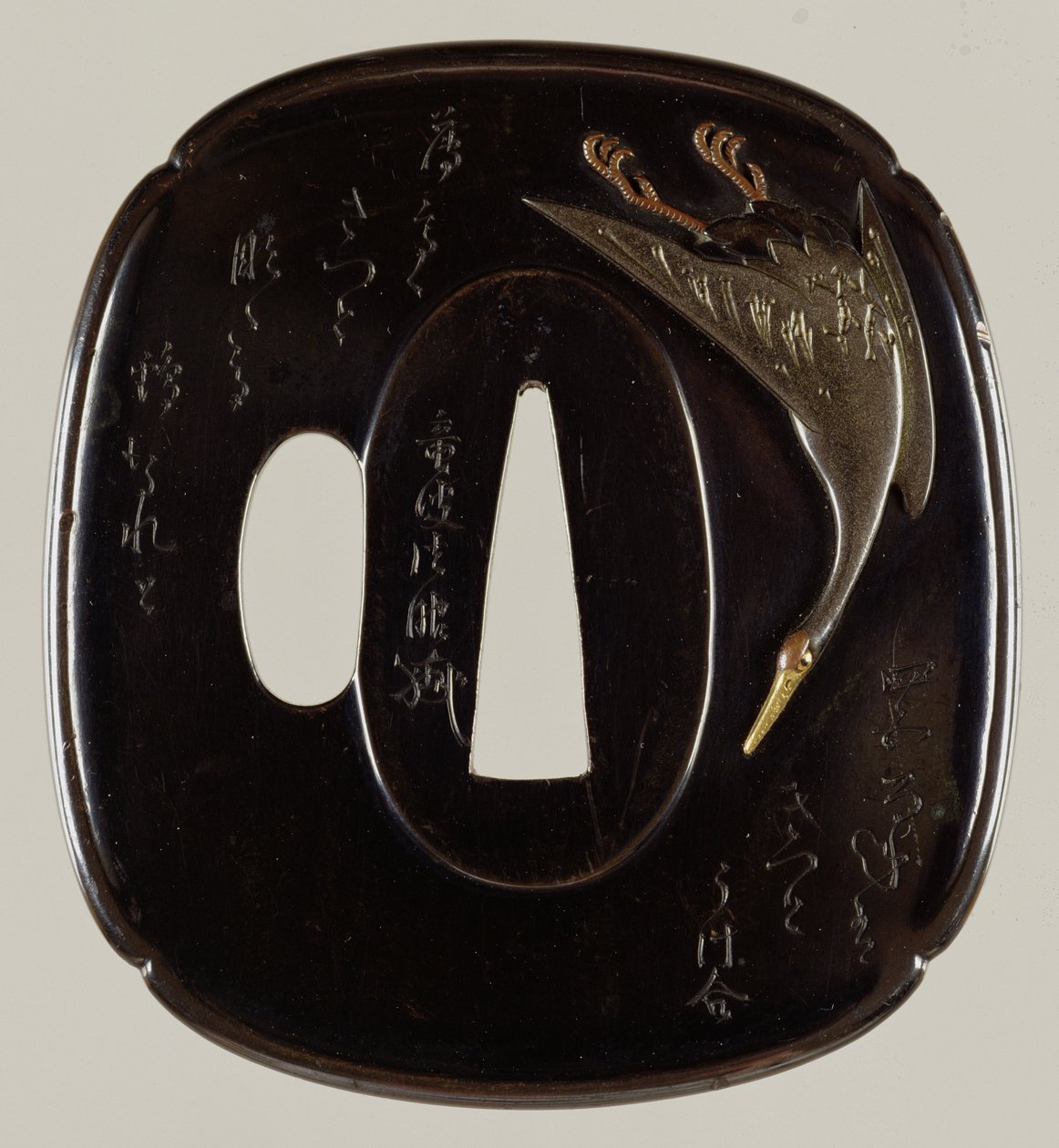 Tsuba Guardamano (aleación de cobre y oro shakudo) de Japanese School
