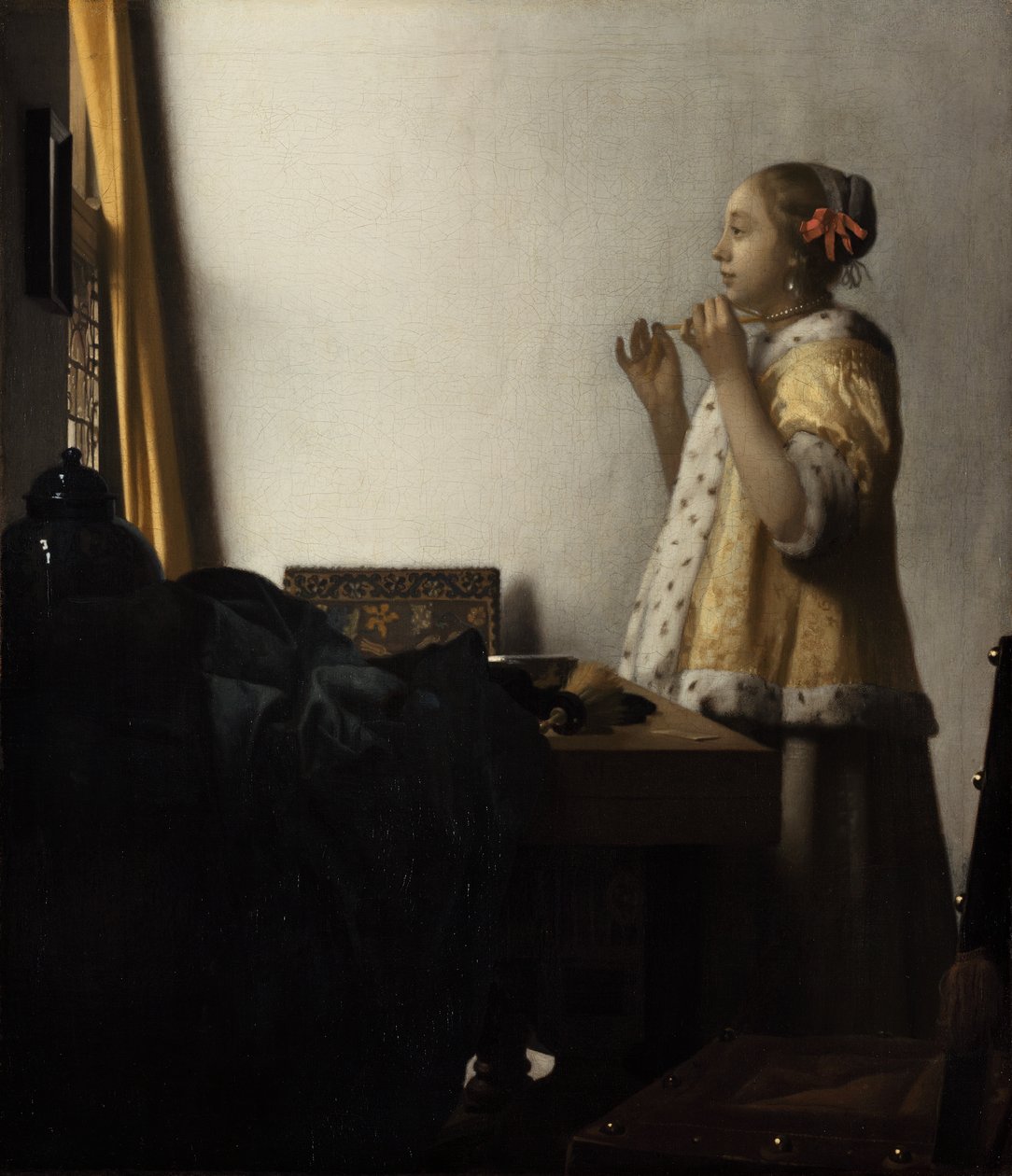 Joven con collar de perlas de Johannes Vermeer