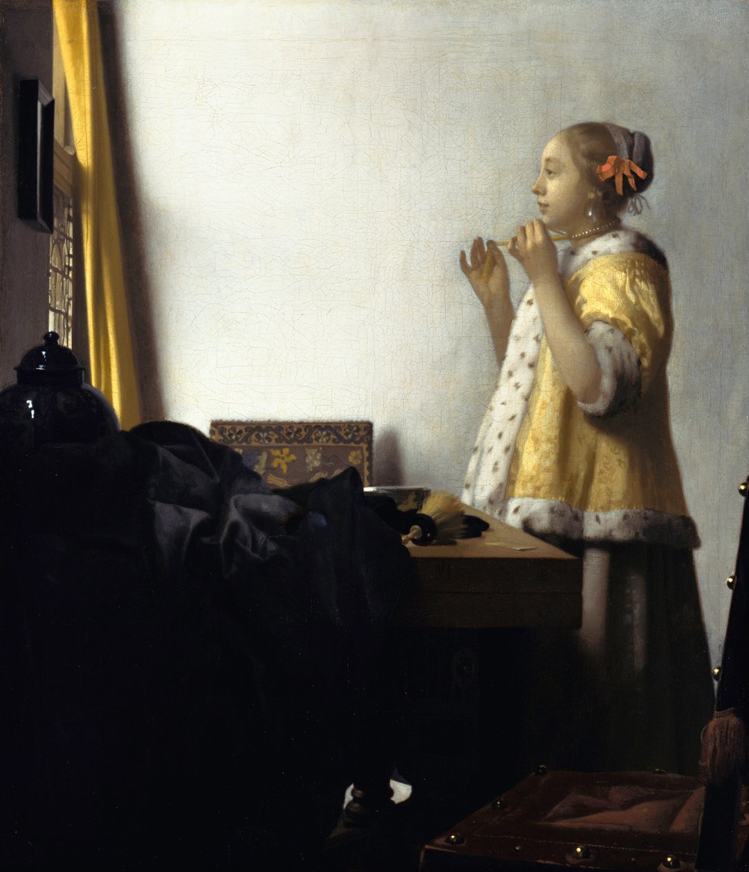 Mujer joven con collar de perlas de Johannes Vermeer