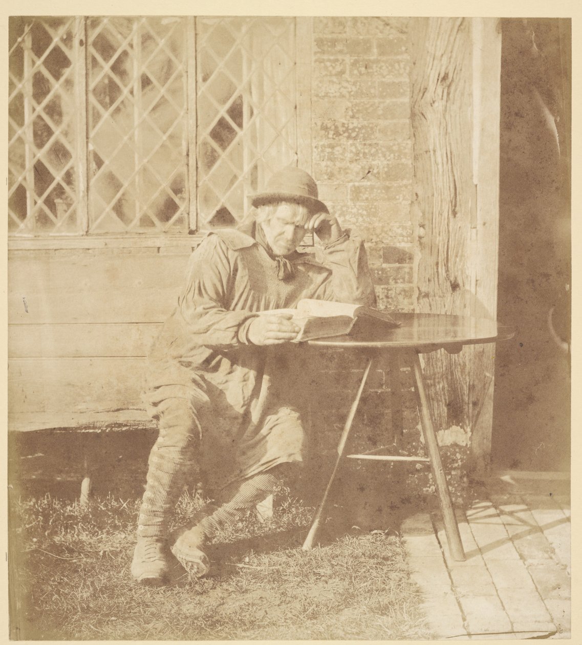 [Hombre leyendo un libro] de John Whistler