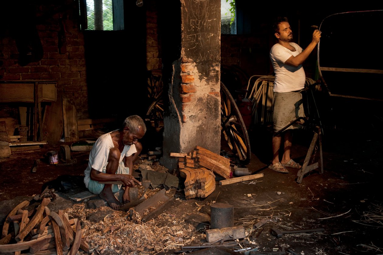 Tiradores de rickshaw, Calcuta, 2009 (foto) de Jon Nicholson