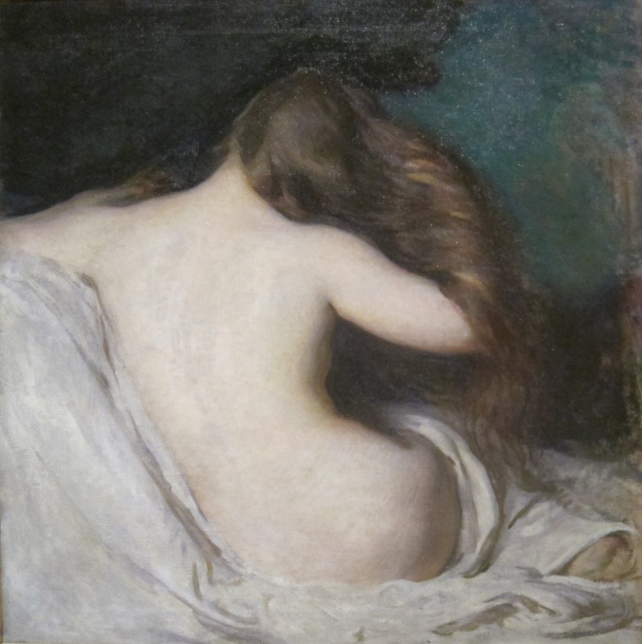 Mujer secándose el pelo de Joseph DeCamp