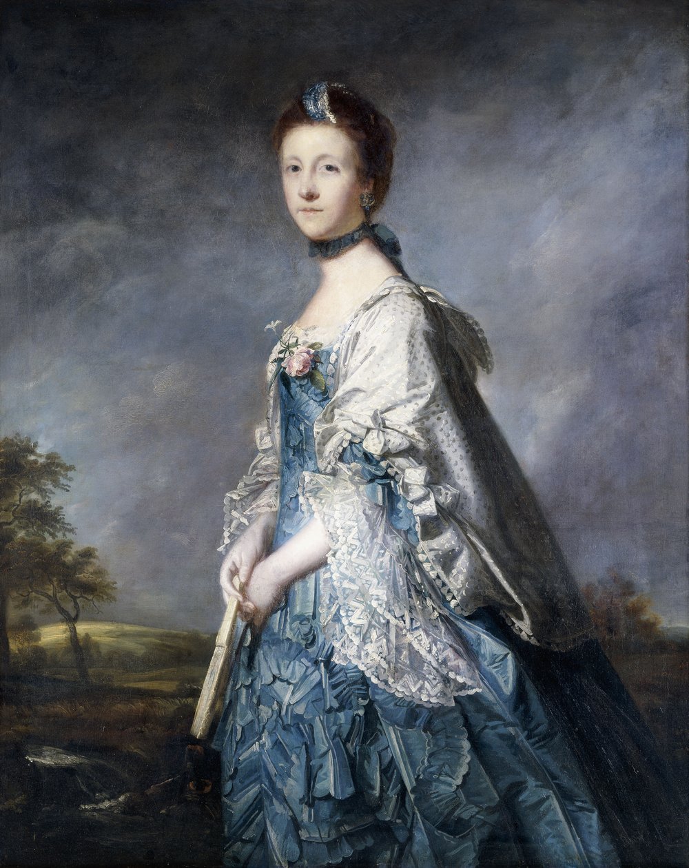 Retrato de Anne, condesa de Winterton, de pie, tres cuartos de longitud, vistiendo un vestido azul y un chal con encaje, sosteniendo un abanico, en un paisaje de Joshua Reynolds