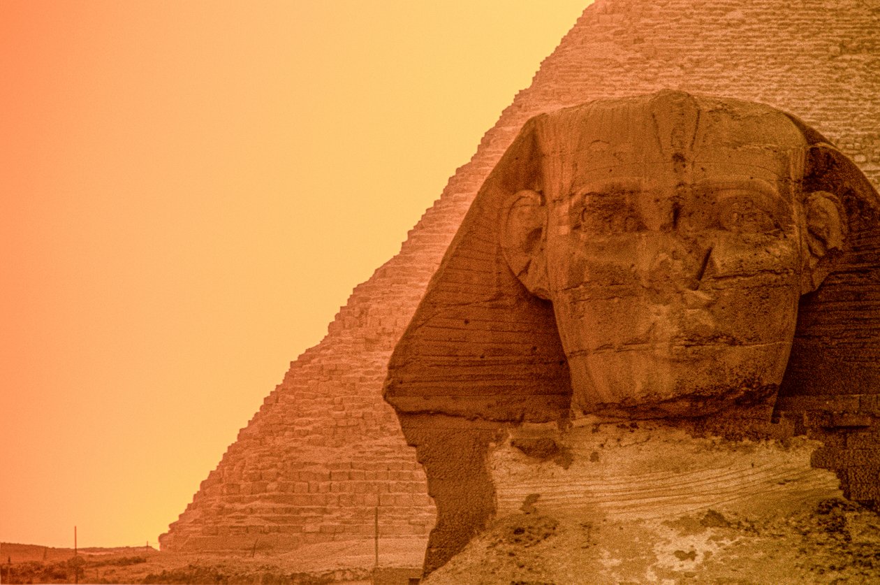 Puesta de sol en la meseta de Giza y las pirámides, Egipto,Reino Antiguo,Esfinge de Kenneth Garrett