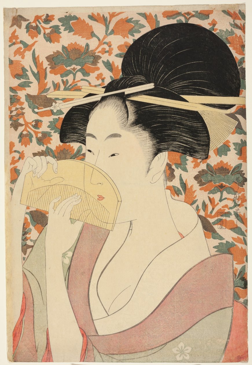 Mujer sosteniendo un peine de concha de tortuga de Kitagawa Utamaro