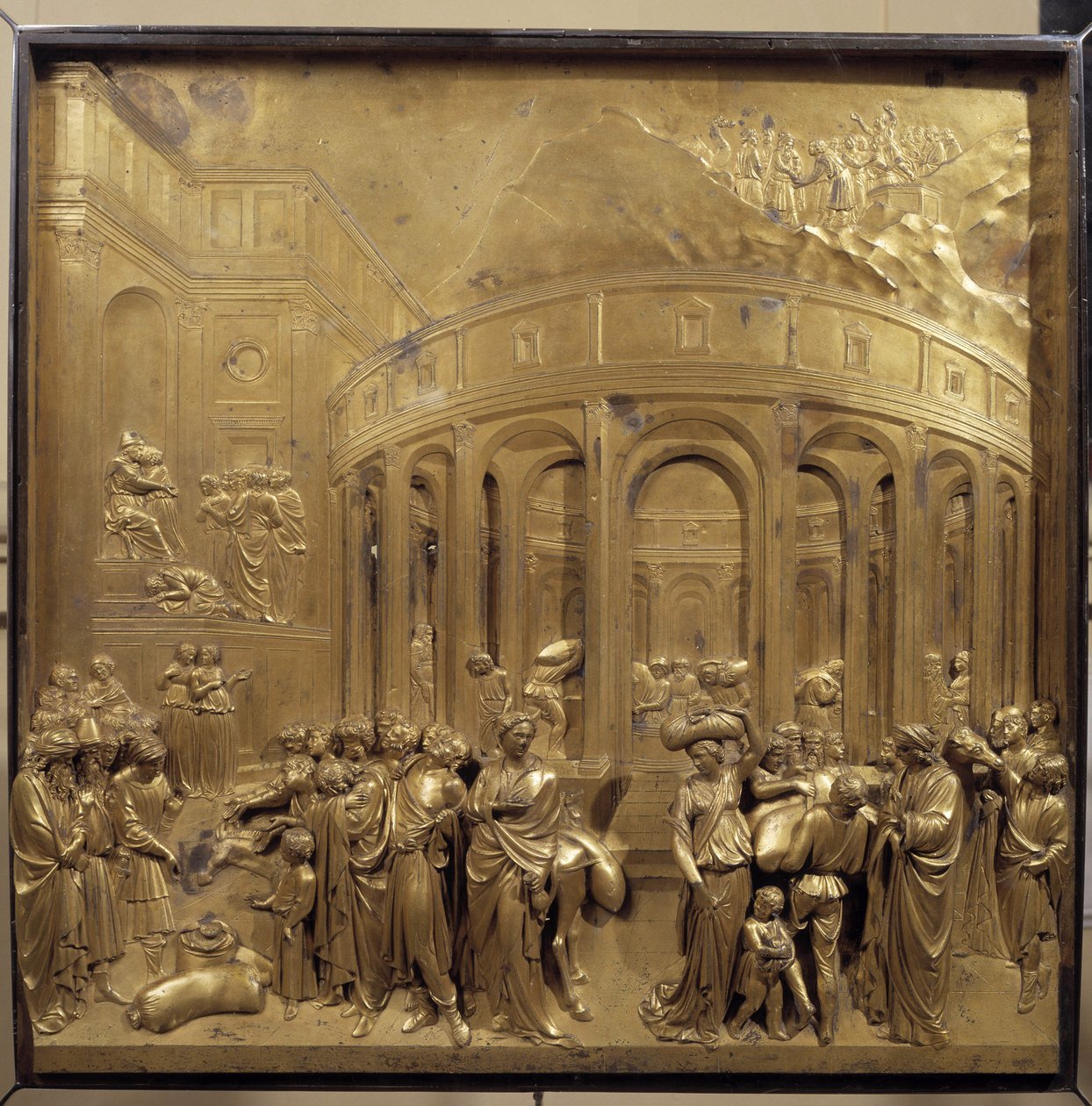Historia de la vida de José. La cosecha de trigo: los campesinos traen los sacos de cereales. Panel original de la puerta del Paraíso de Lorenzo Ghiberti