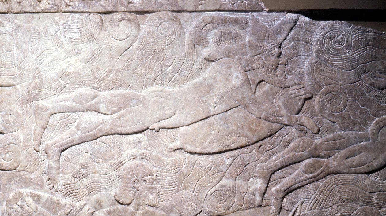 Durante mucho tiempo se creyó que este bajorrelieve representaba a un hombre respirando bajo el agua gracias al aire contenido en una superficie de piel. Ahora se cree que es un nadador sostenido por un flotador que le sirve de boya - bajorrelieve, Mesopot de Mesopotamian