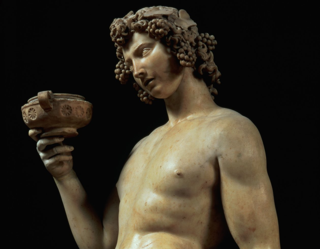 La embriaguez de Baco, detalle de su cabeza, escultura de Miguel Ángel Buonarroti (detalle) de Michelangelo Buonarroti