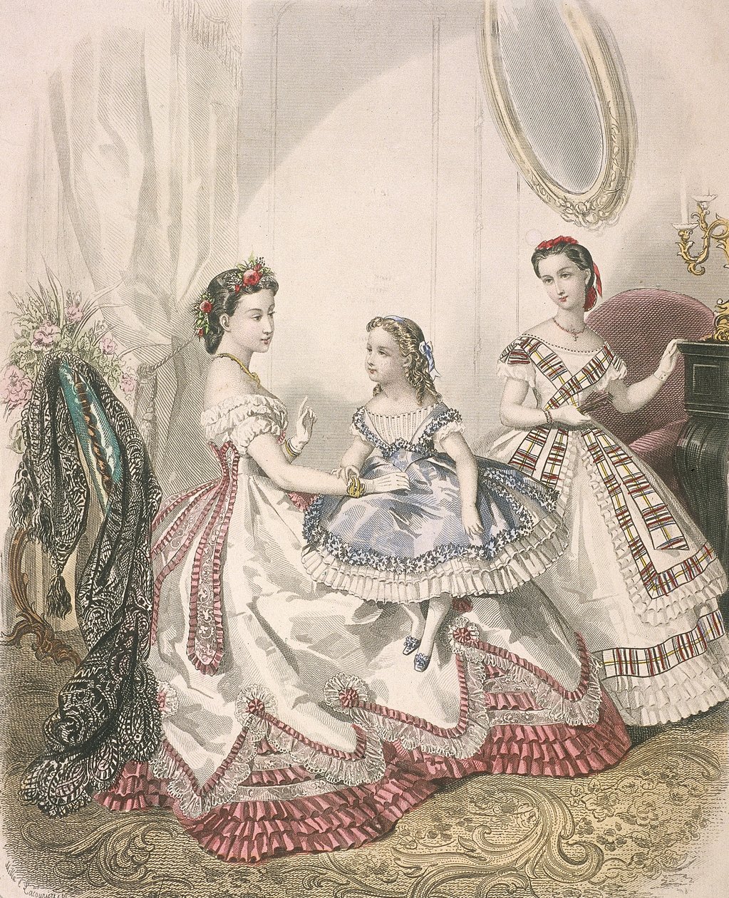 Dos mujeres y una niña pequeña con las últimas modas de interior de Millia Lacouriere