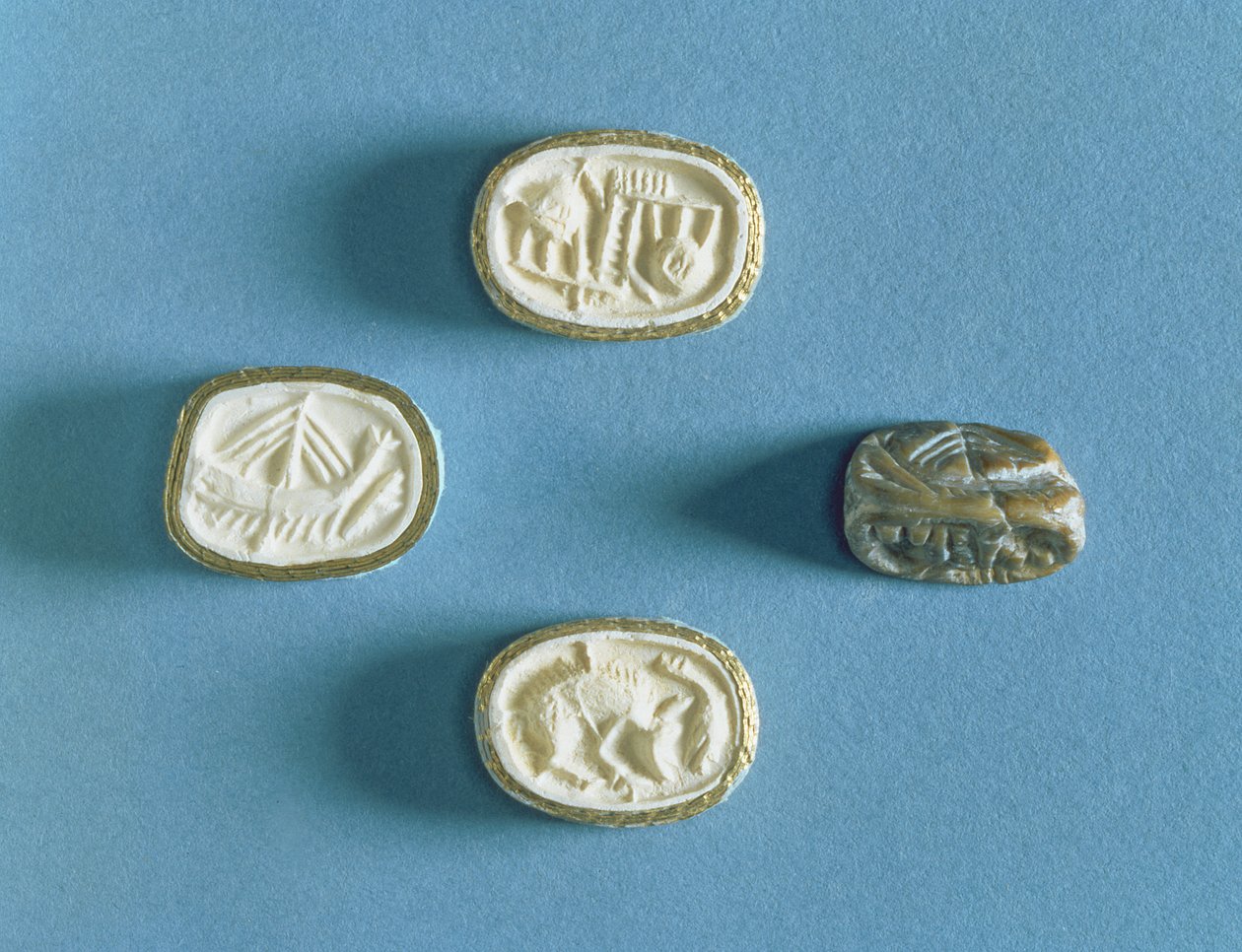 Sello con tres impresiones de Knossos, Minoico temprano de Minoan