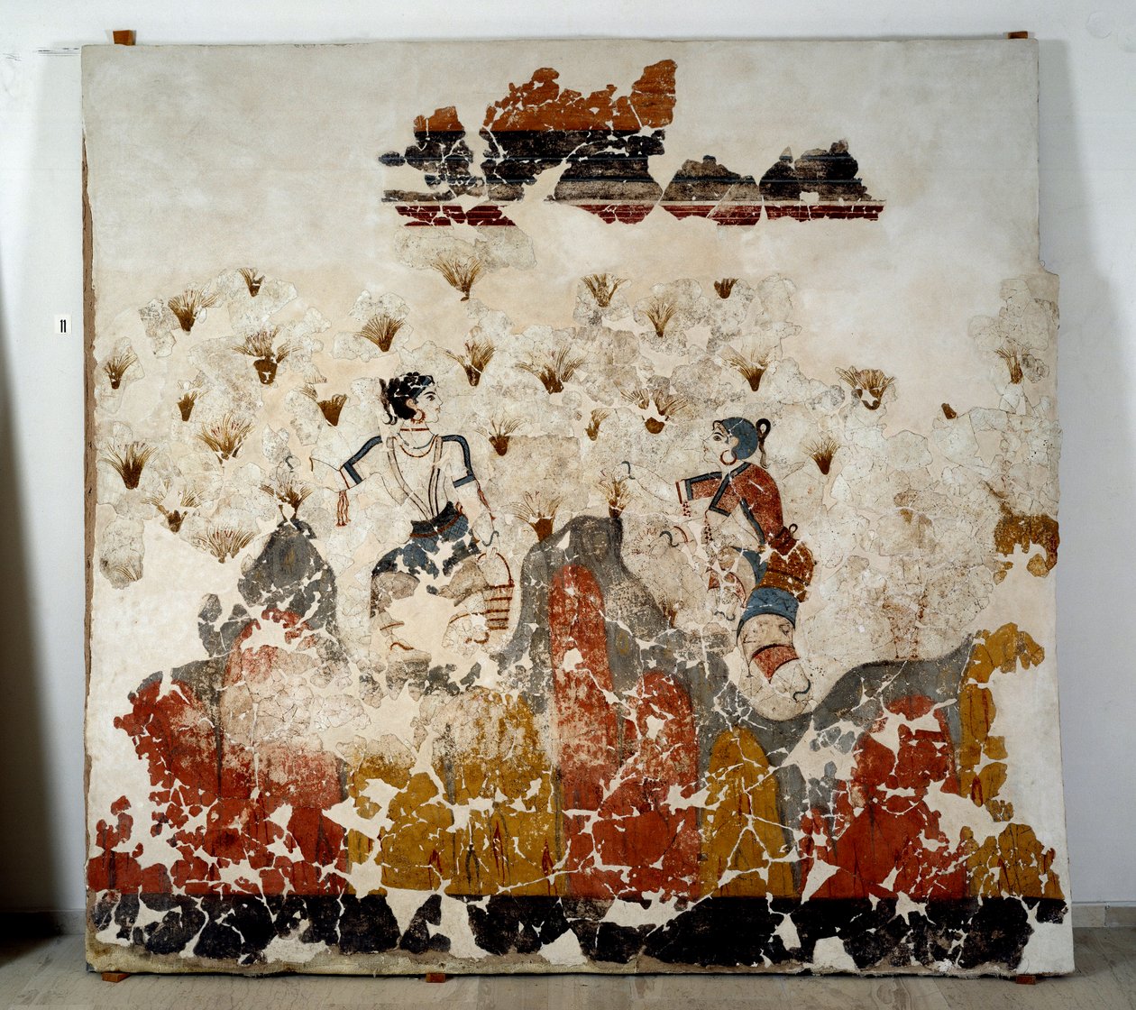 Civilización minoica: mujeres recogiendo azafrán. Fresco del estanque lustral de Xeste 3 en Akrotiri (Thera), Santorini. Dim. 244x266 cm Siglo XVI a.C. Santorini, Colección de los frescos de Akrotiri en Thera de Minoan