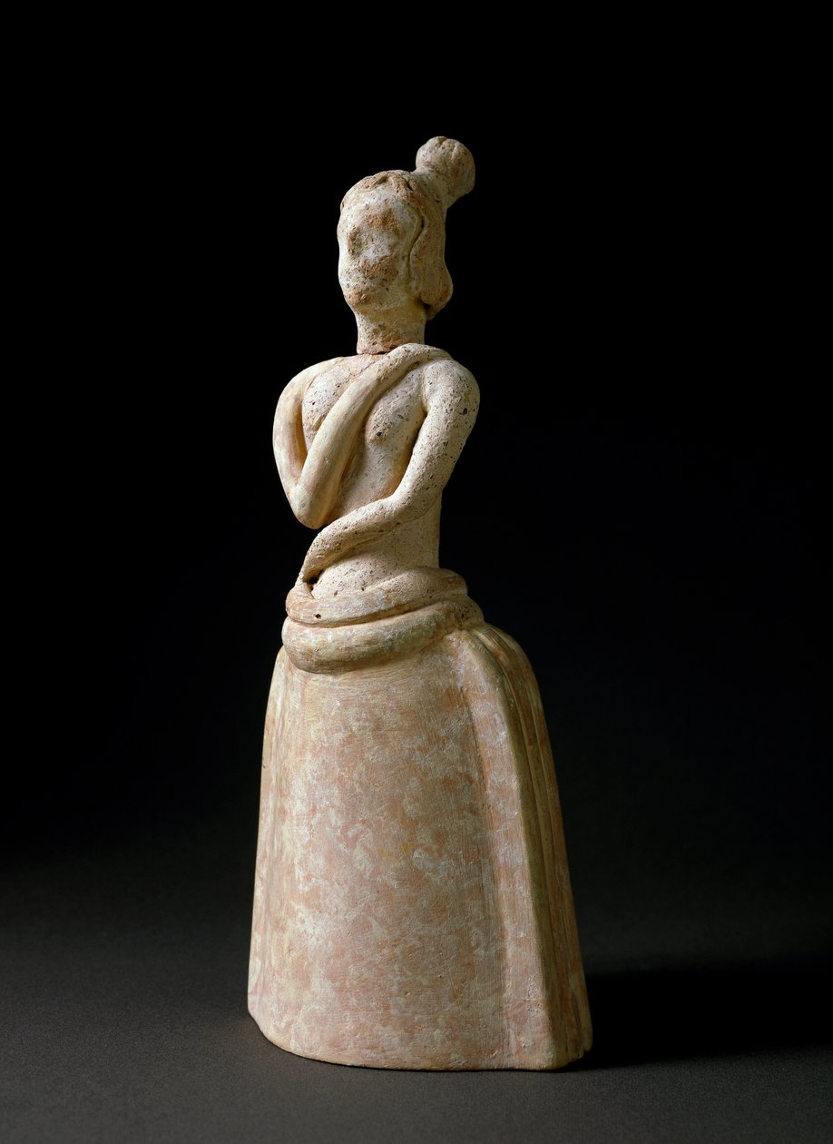 Arte minoico: figurilla de terracota de una mujer en actitud de adoración de Minoan