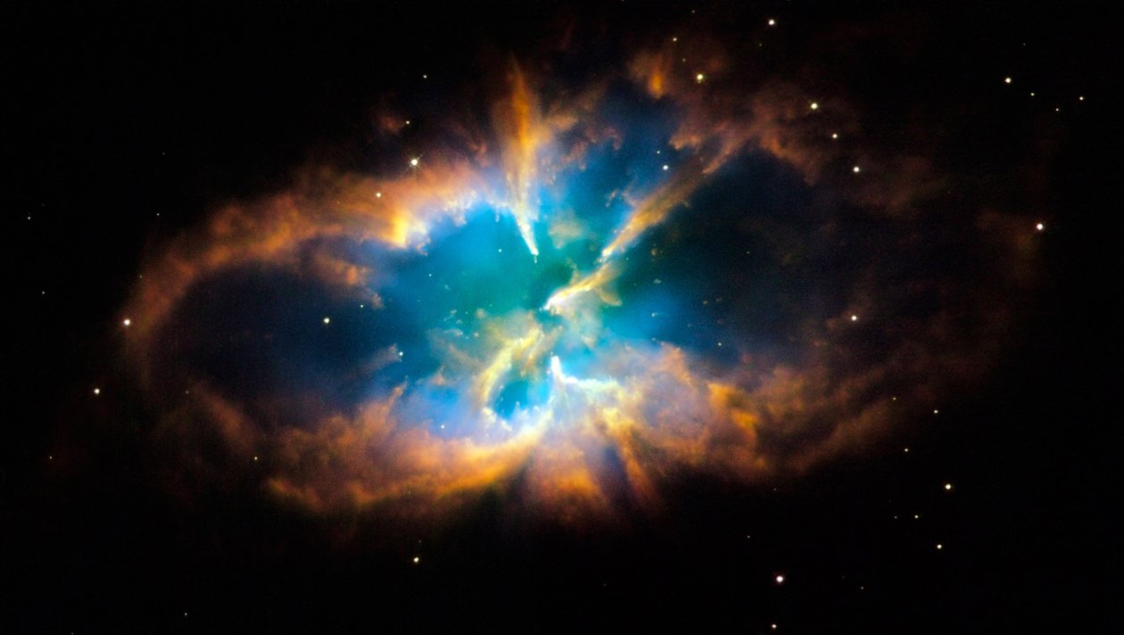 Nebulosa planetaria NGC 2818 en la constelación austral de Pyxis (La Brújula). Capas y conchas brillantes de gas fueron creadas cuando una estrella arrojó sus capas exteriores al espacio después de quedarse sin combustible nuclear de National Aeronautics and Space Administration National Aeronautics and Space Administration