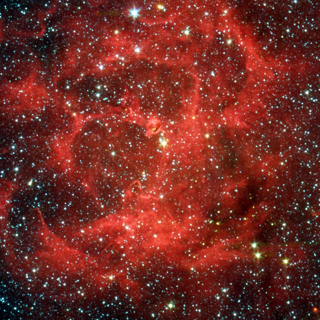 Comparación de vistas en luz visible e infrarroja del telescopio espacial Spitzer de la nebulosa Trífida brillante, una nube gigante de gas y polvo formadora de estrellas ubicada a 5,400 años luz de distancia en Sagitario. Crédito NASA de National Aeronautics and Space Administration National Aeronautics and Space Administration