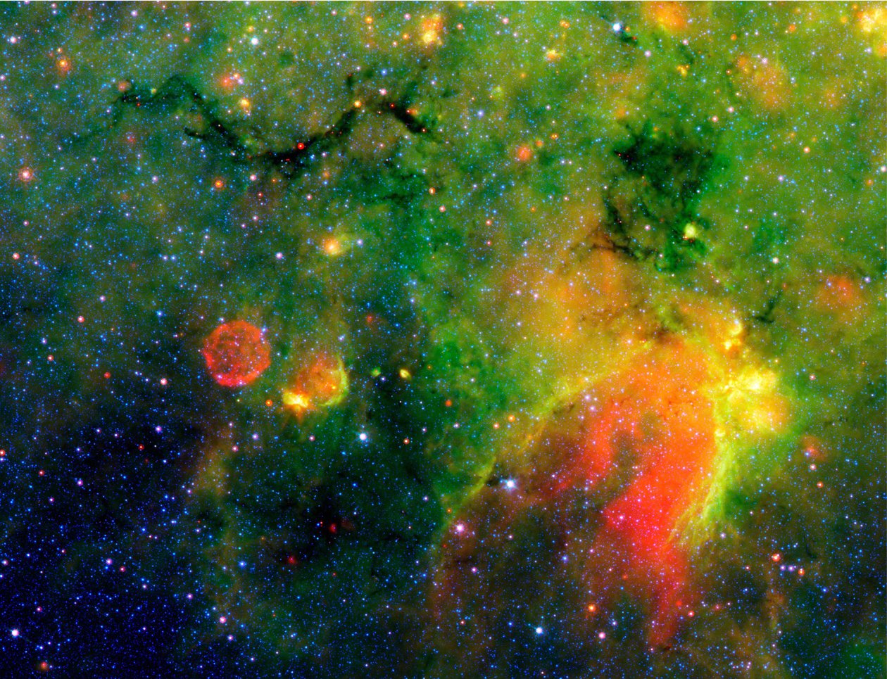 Imagen infrarroja del telescopio espacial Spitzer de una serpiente (arriba a la izquierda) y el entorno tormentoso circundante. En realidad, es el núcleo de una nube espesa y ahumada lo suficientemente grande como para tragar docenas de sistemas solares. C de National Aeronautics and Space Administration National Aeronautics and Space Administration