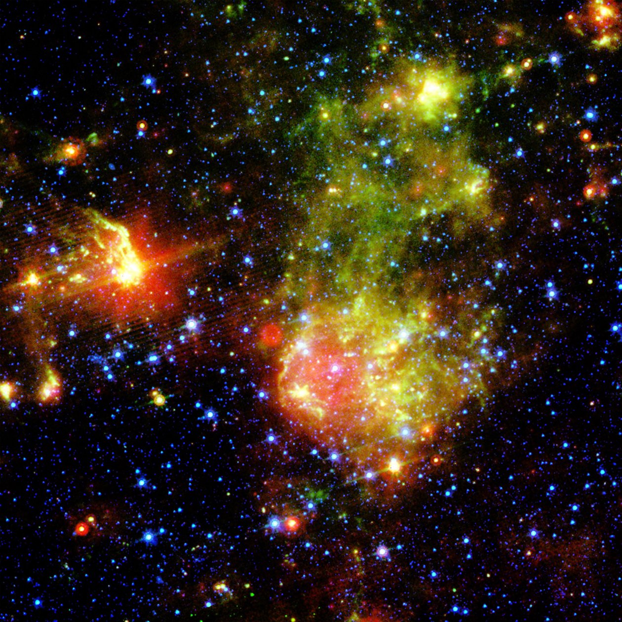 Remanente de supernova 1E0102.2-7219 junto a la Nebulosa N76 en una región brillante de formación estelar de la Pequeña Nube de Magallanes, ubicada a unos 200,000 años luz de la Tierra. Crédito NASA. Ciencia Astronomía de National Aeronautics and Space Administration National Aeronautics and Space Administration