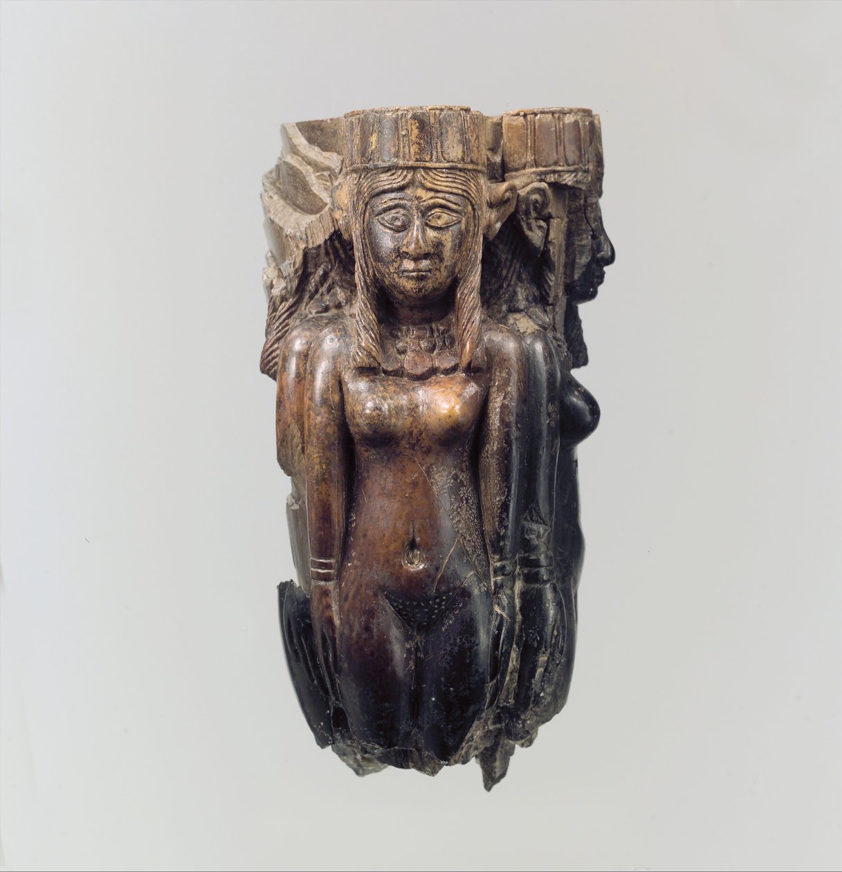 Mango de abanico o matamoscas en forma de cuatro figuras femeninas, c. siglo VIII-VII a.C. (marfil) de Neo Assyrian