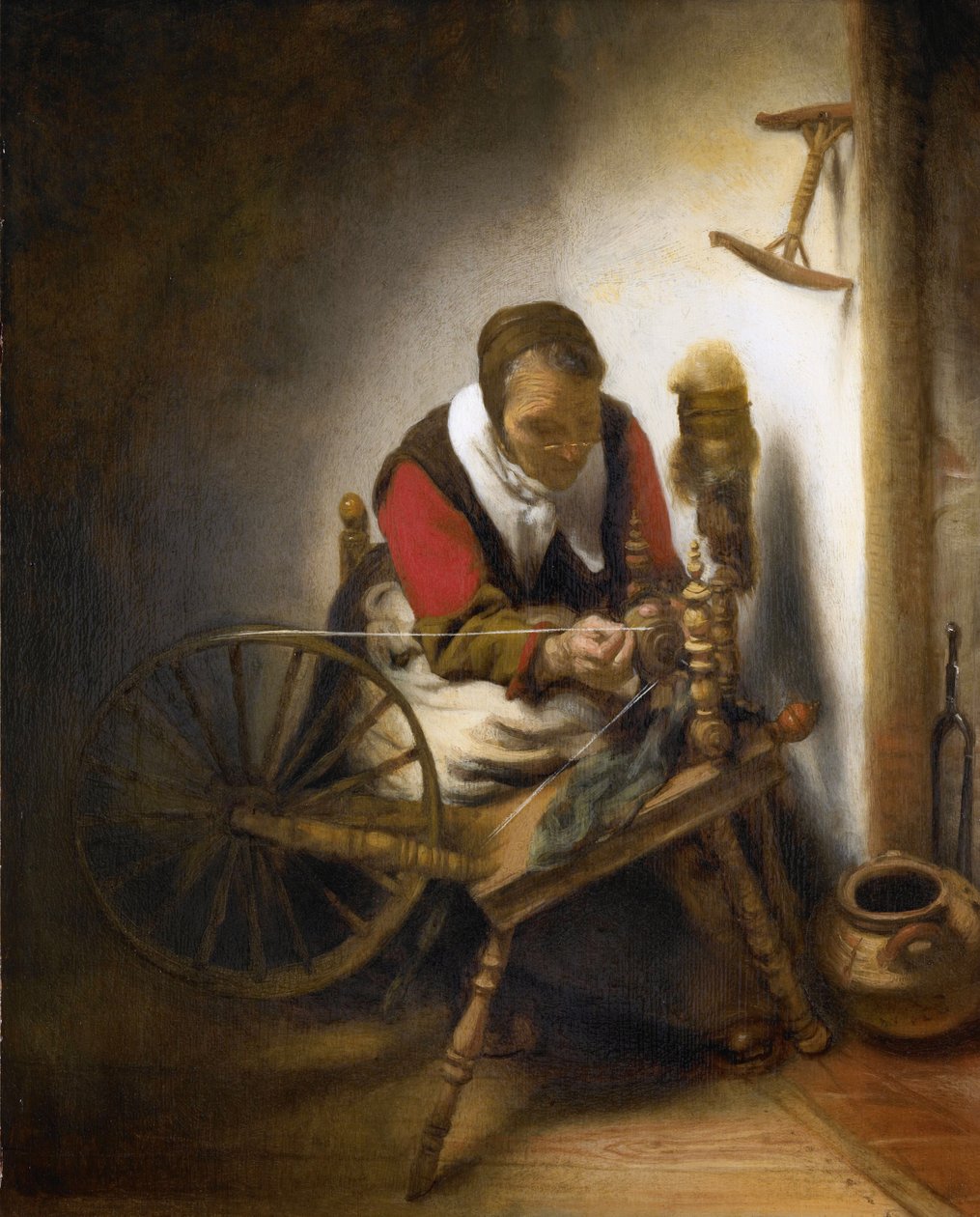 Una mujer hilando de Nicolaes Maes