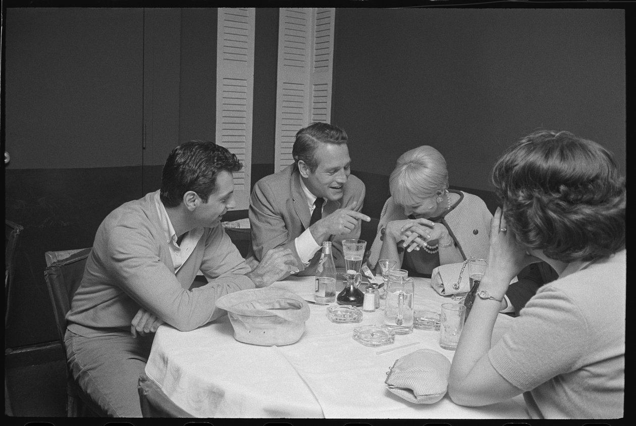 Paul Newman, Mort Sahl y Joanne Woodward bromeando en la cena de Orlando Suero