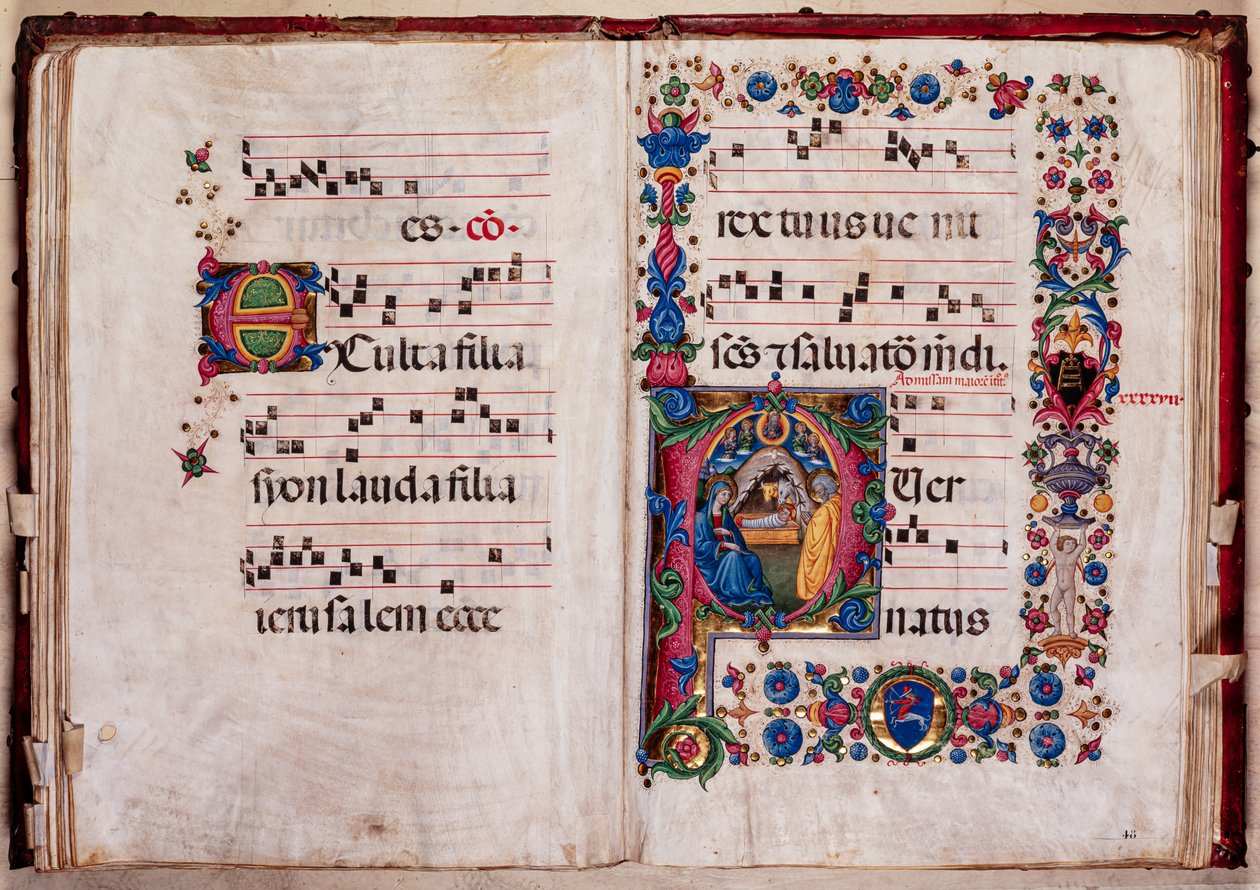 Biblioteca Piccolomini: libro de coro, cod. 102.8, ff. 47v-48r con la "Natividad", de Pellegrino di Mariano. de Pellegrino di Mariano
