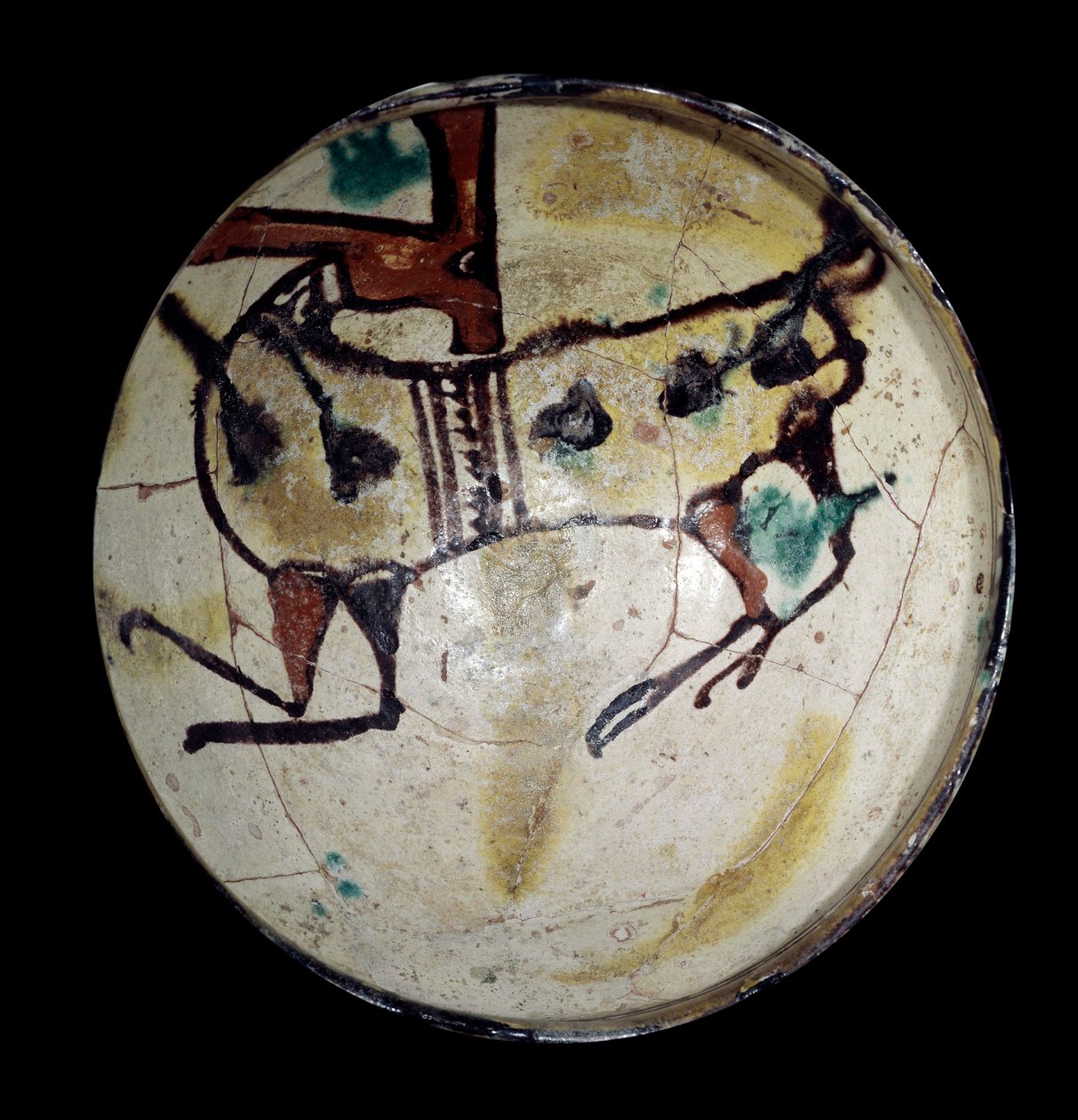 Arte persa: copa de terracota con un íbice de Persian School