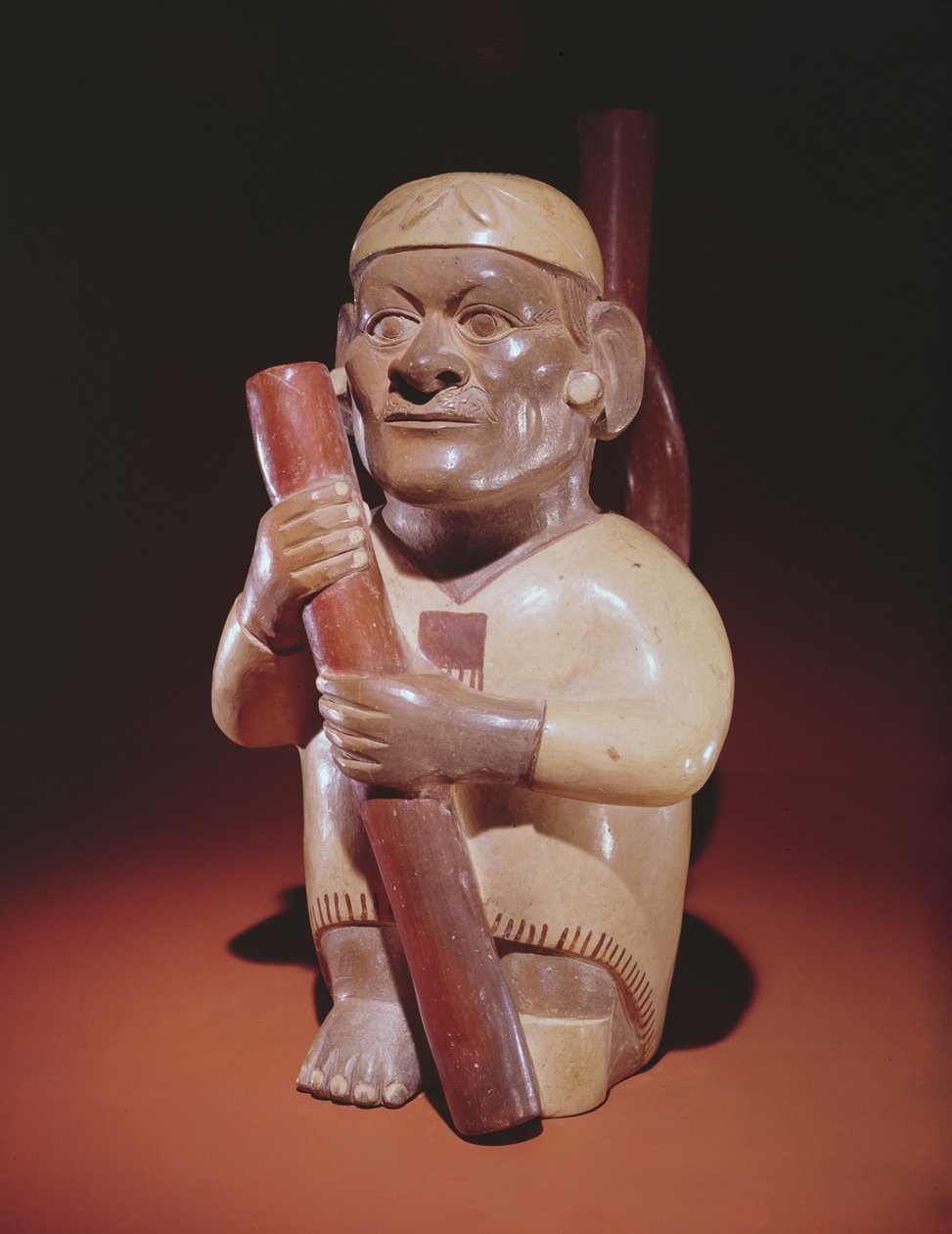 Hombre sentado con una pierna, Cultura Mochica (barro) de Peruvian School
