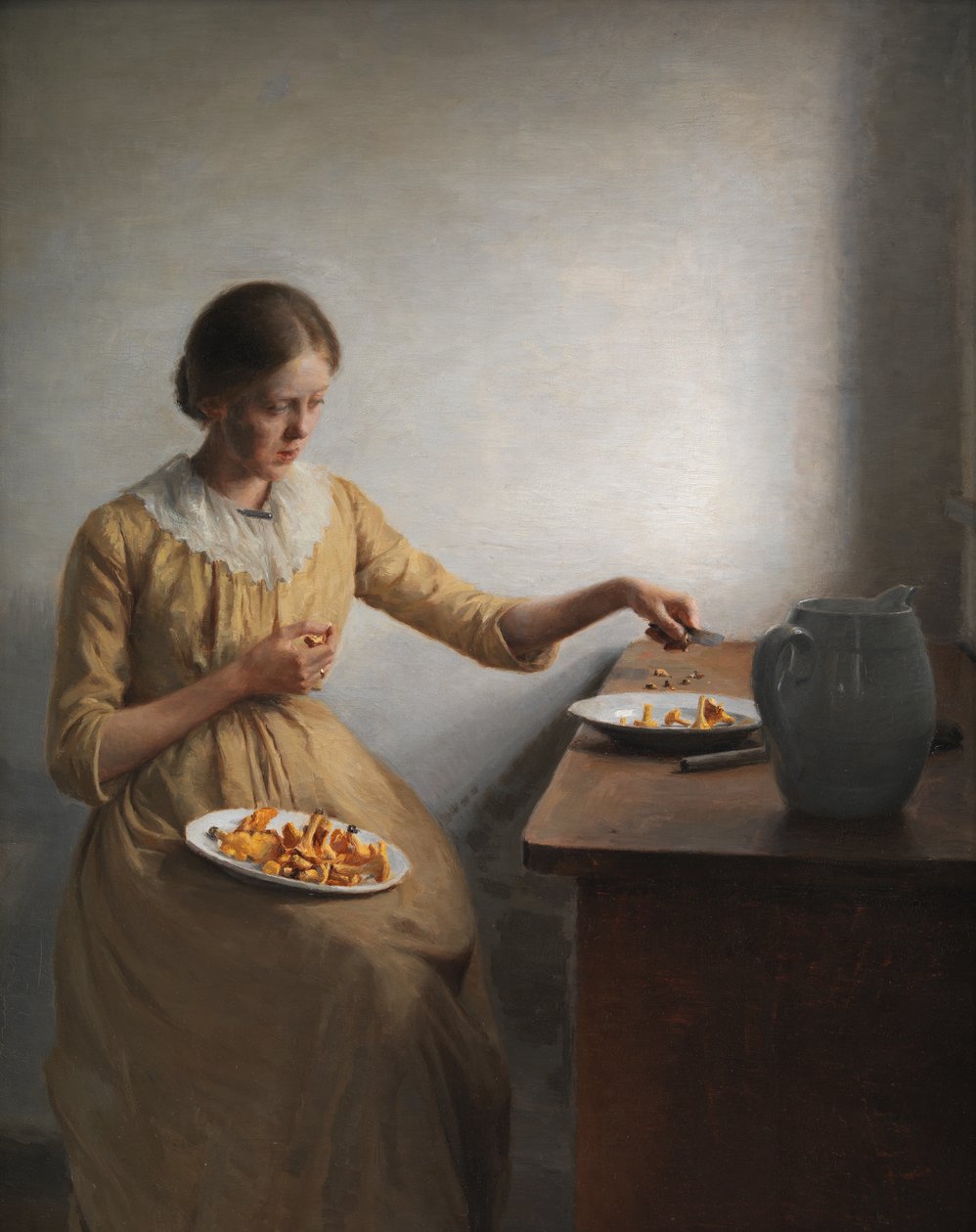 Una joven preparando rebozuelos de Peter Vilhelm Ilsted