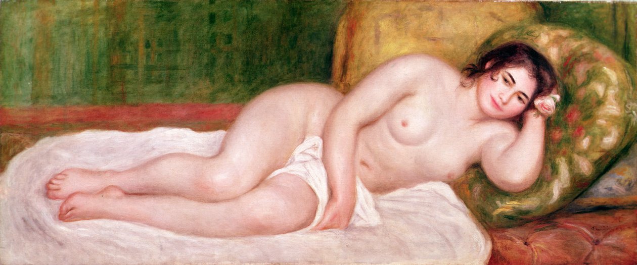Desnudo femenino en un sofá de Pierre Auguste Renoir