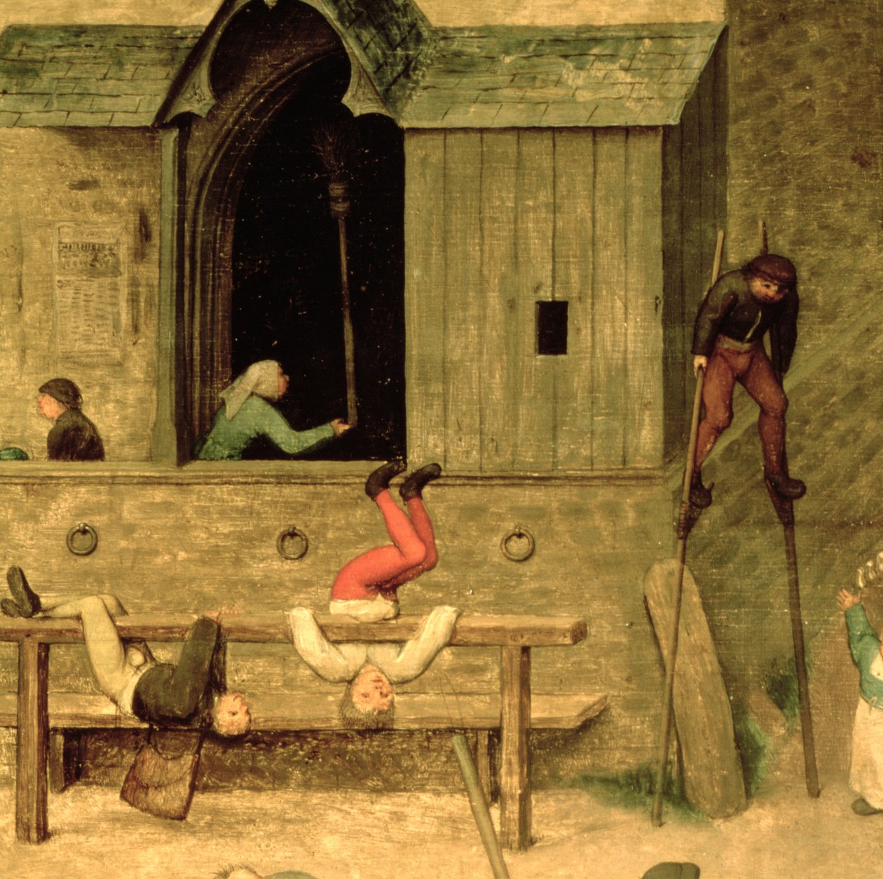 Juegos de niños (Kinderspiele): detalle de un niño en zancos y niños jugando en las acciones, 1560 (detalle) de Pieter Bruegel the Elder