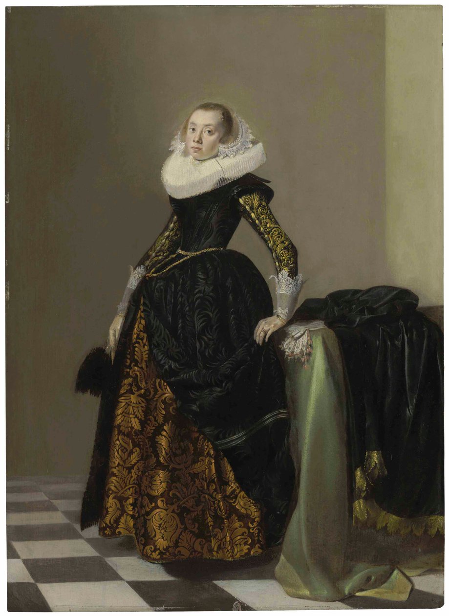Retrato de una joven ricamente vestida, de cuerpo entero, ante una mesa drapeada de Pieter Codde