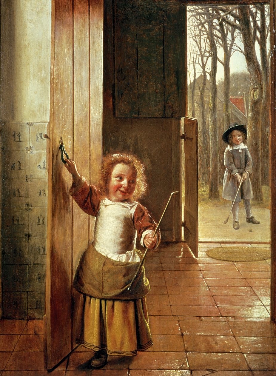 Niños en una puerta con palos de 