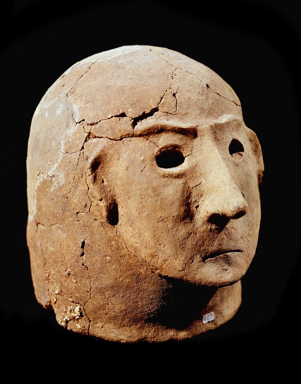 Prehistoria: cabeza de terracota de la necrópolis de Cancelli. Civilización de los Apeninos (Edad del Bronce italiana). 1400-1300 a.C. Perugia, Museo Archeologico Nazionale dell