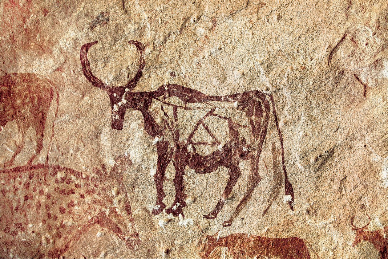 Pintura rupestre: representación de un cérvido. Cueva de Tadrart Acacus, Libia de Prehistoric Prehistoric