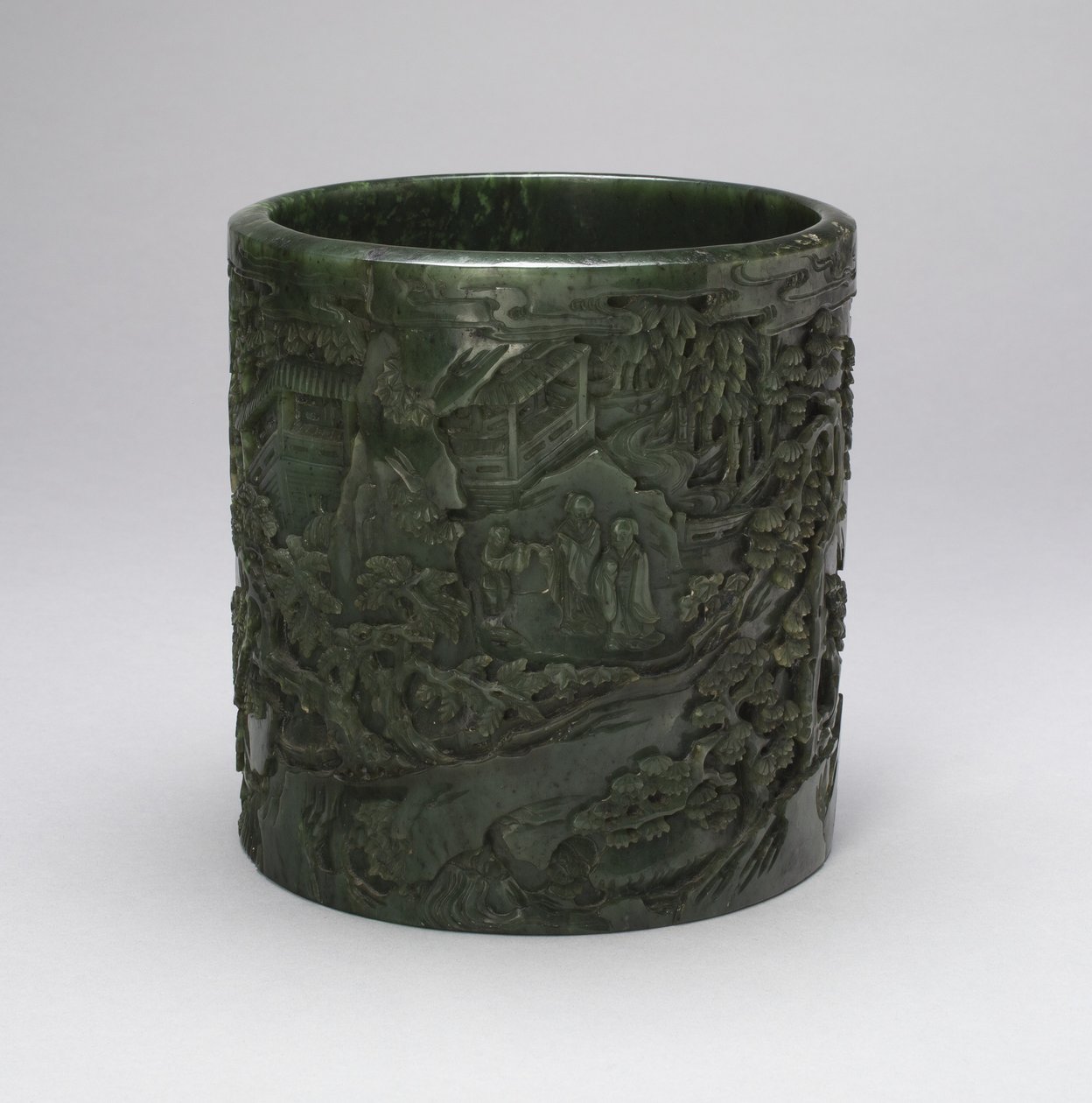 Pote de pinceles con eruditos y asistentes en un paisaje montañoso de Qing Dynasty Chinese School
