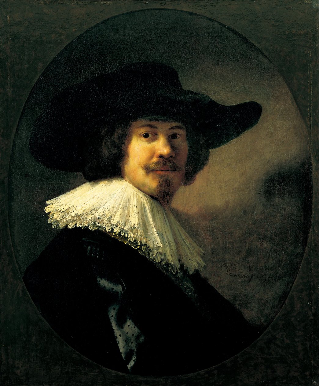 Retrato de un hombre con sombrero de ala ancha de Rembrandt van Rijn