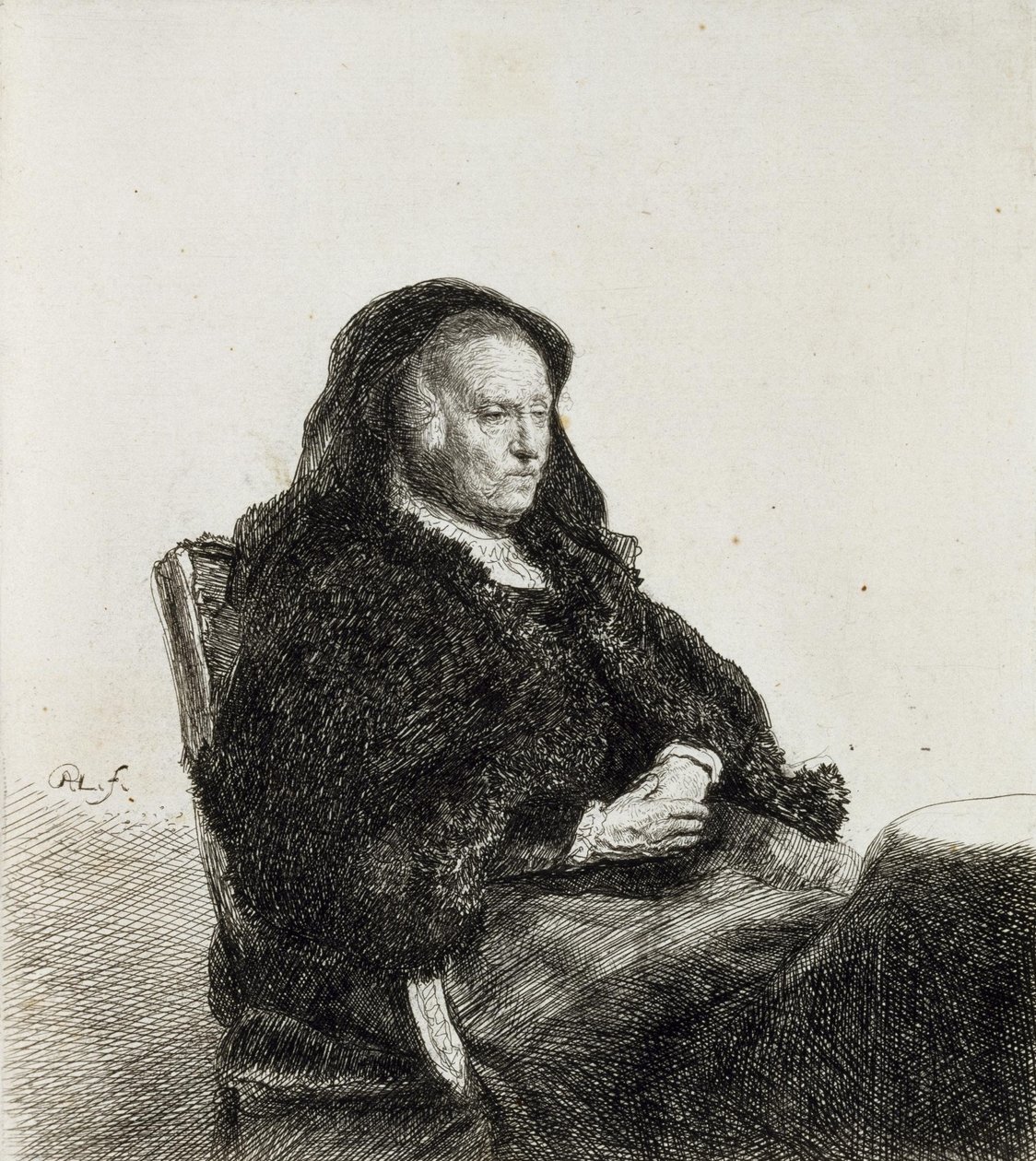 La madre del artista sentada en una mesa de Rembrandt van Rijn