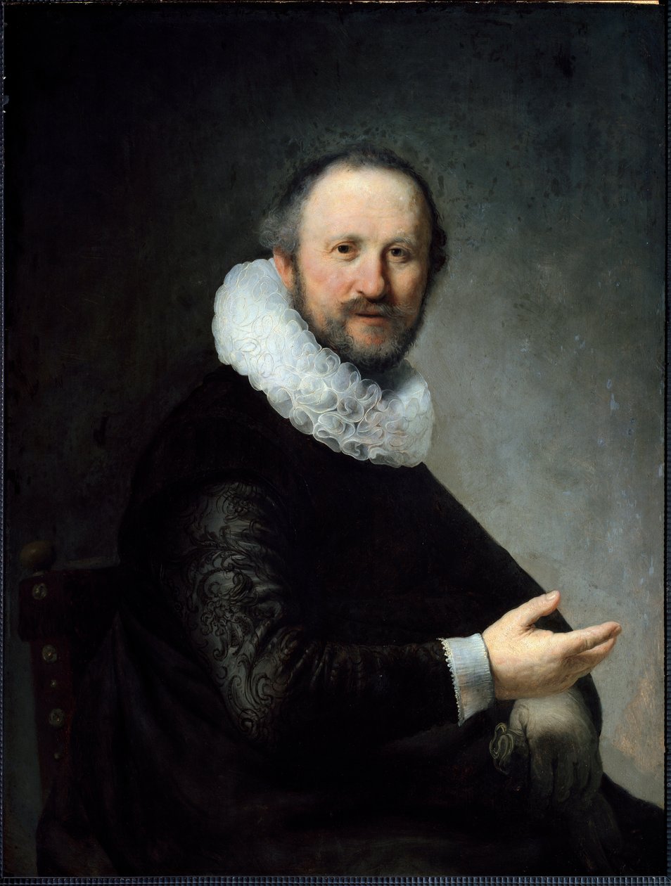 Burgués holandés sosteniendo sus guantes, con gorguera de Rembrandt van Rijn