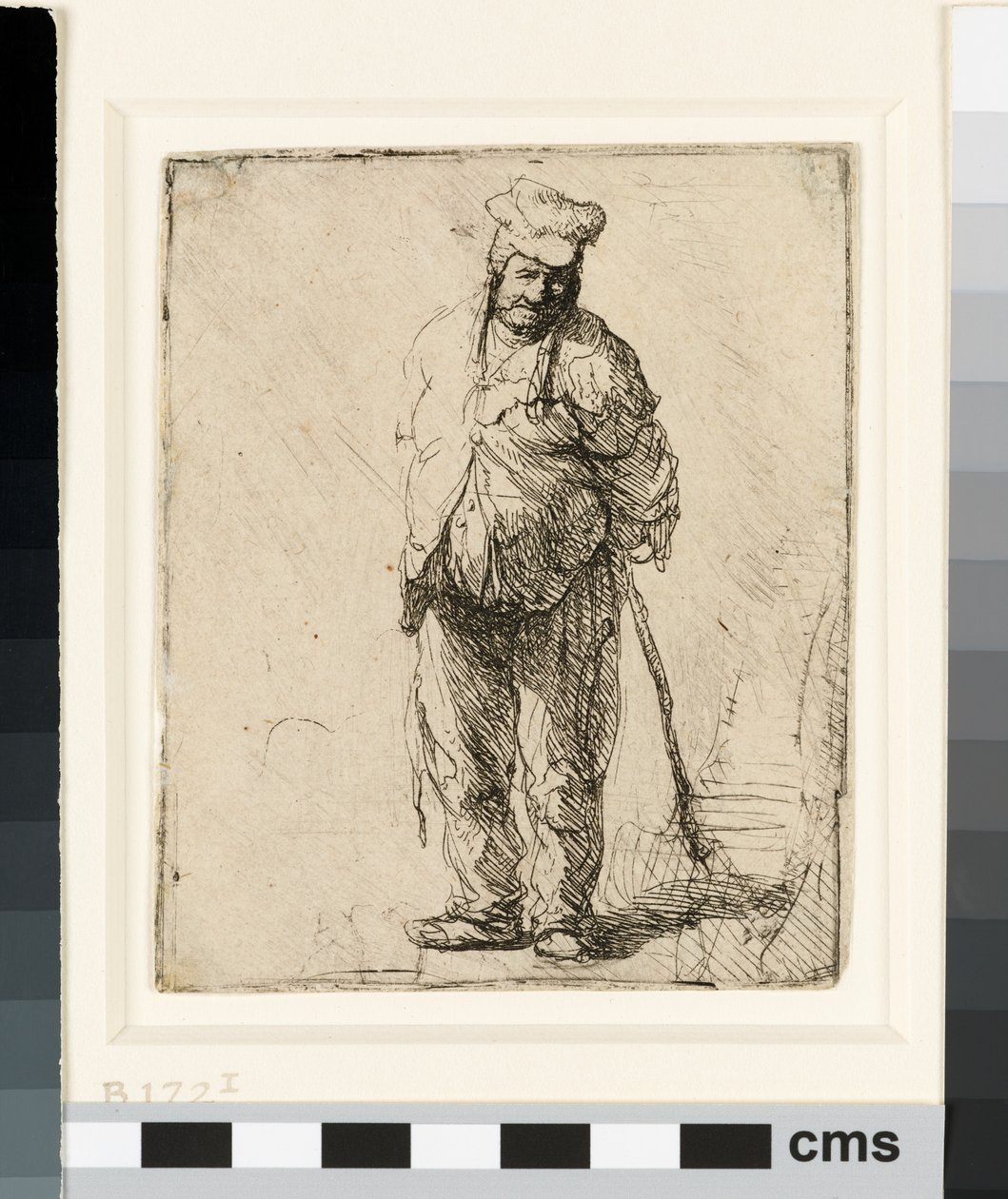 Campesino harapiento con las manos detrás, sosteniendo un palo, c.1630 de Rembrandt van Rijn