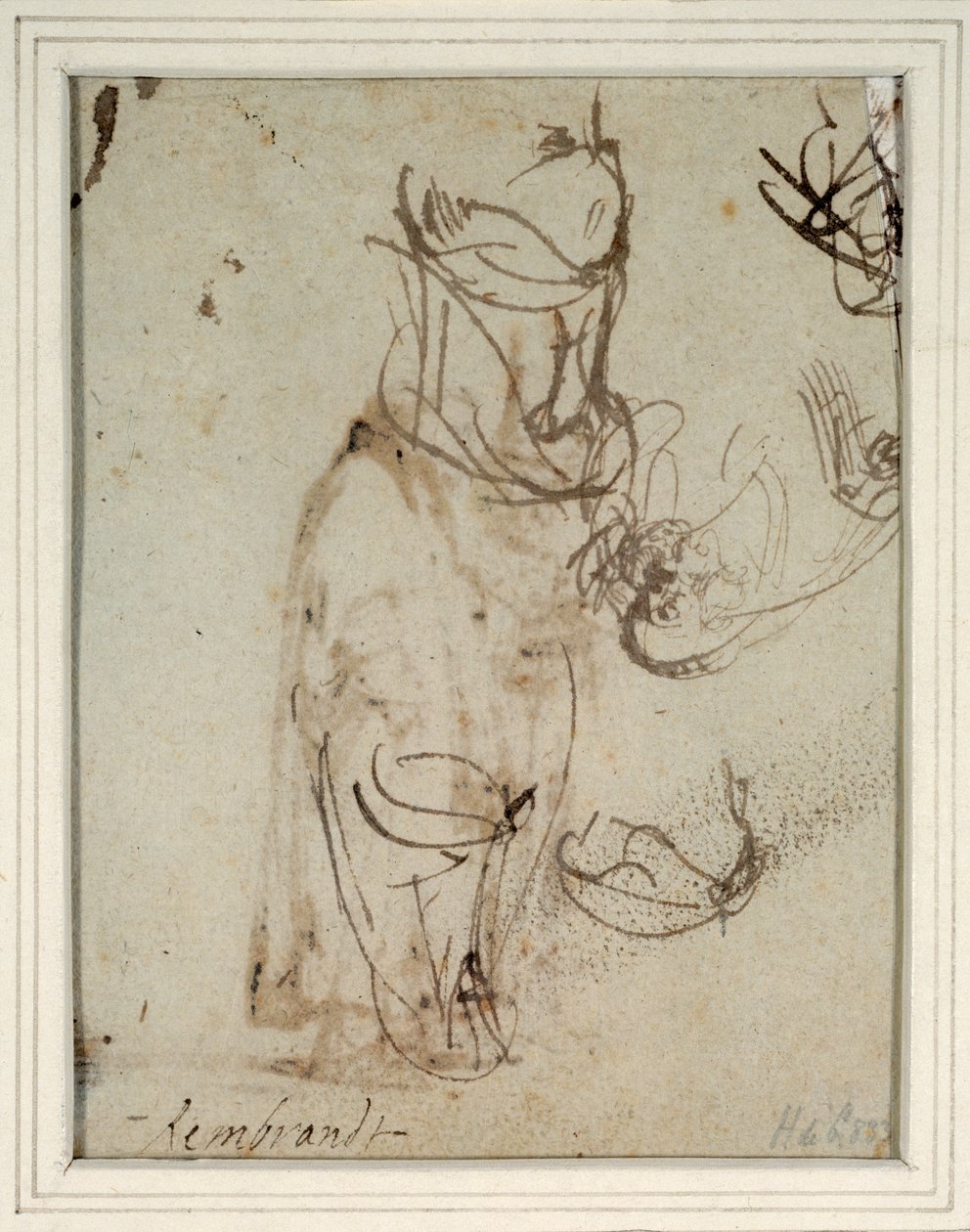 Estudios de un tocado alto; y de una cabeza invertida del recto de Rembrandt Harmensz. van Rijn