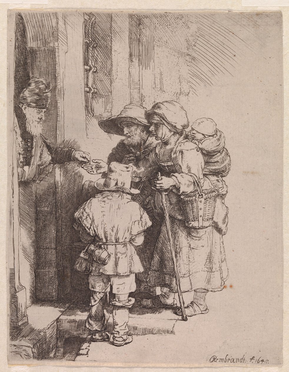 Una familia de mendigos que recibe limosna de Rembrandt van Rijn