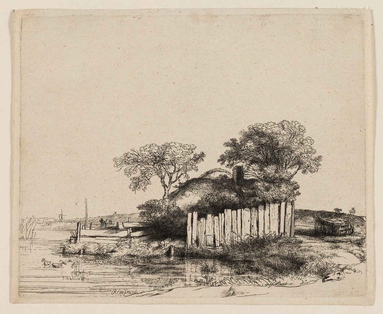 Una cabaña con empalizada blanca de Rembrandt van Rijn
