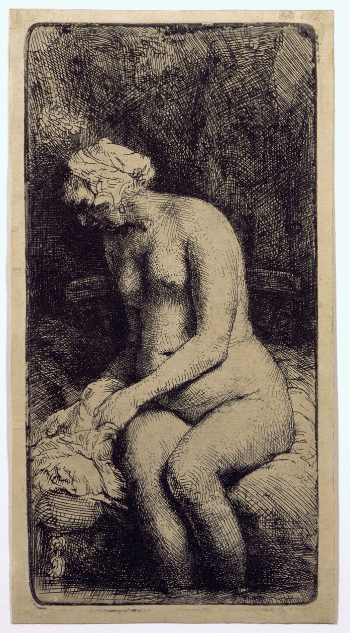 Una mujer bañándose los pies en un arroyo de Rembrandt van Rijn