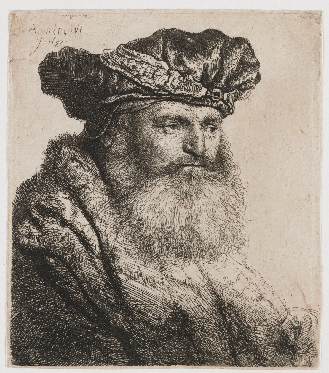 Hombre barbudo con gorra de terciopelo con cierre de joya de Rembrandt van Rijn