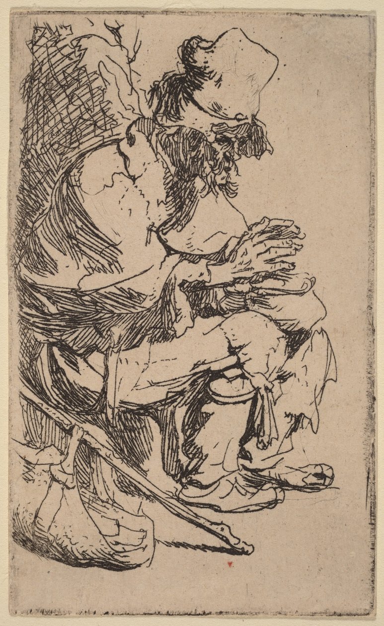 Mendigo sentado calentándose las manos junto a un calentador de comida de Rembrandt van Rijn
