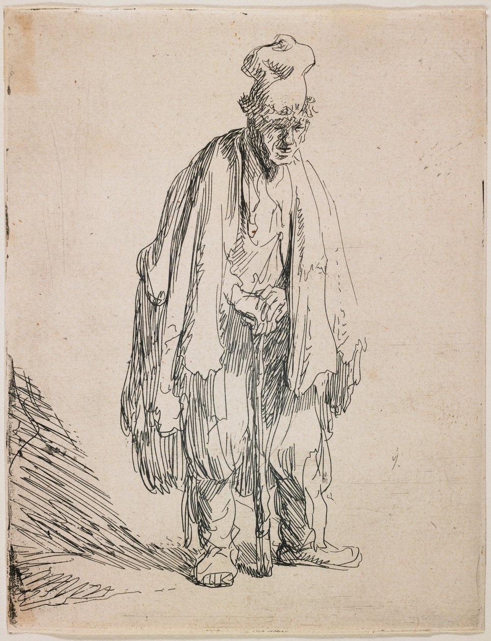 Mendigo con gorra de visera alta apoyado en un bastón de Rembrandt van Rijn