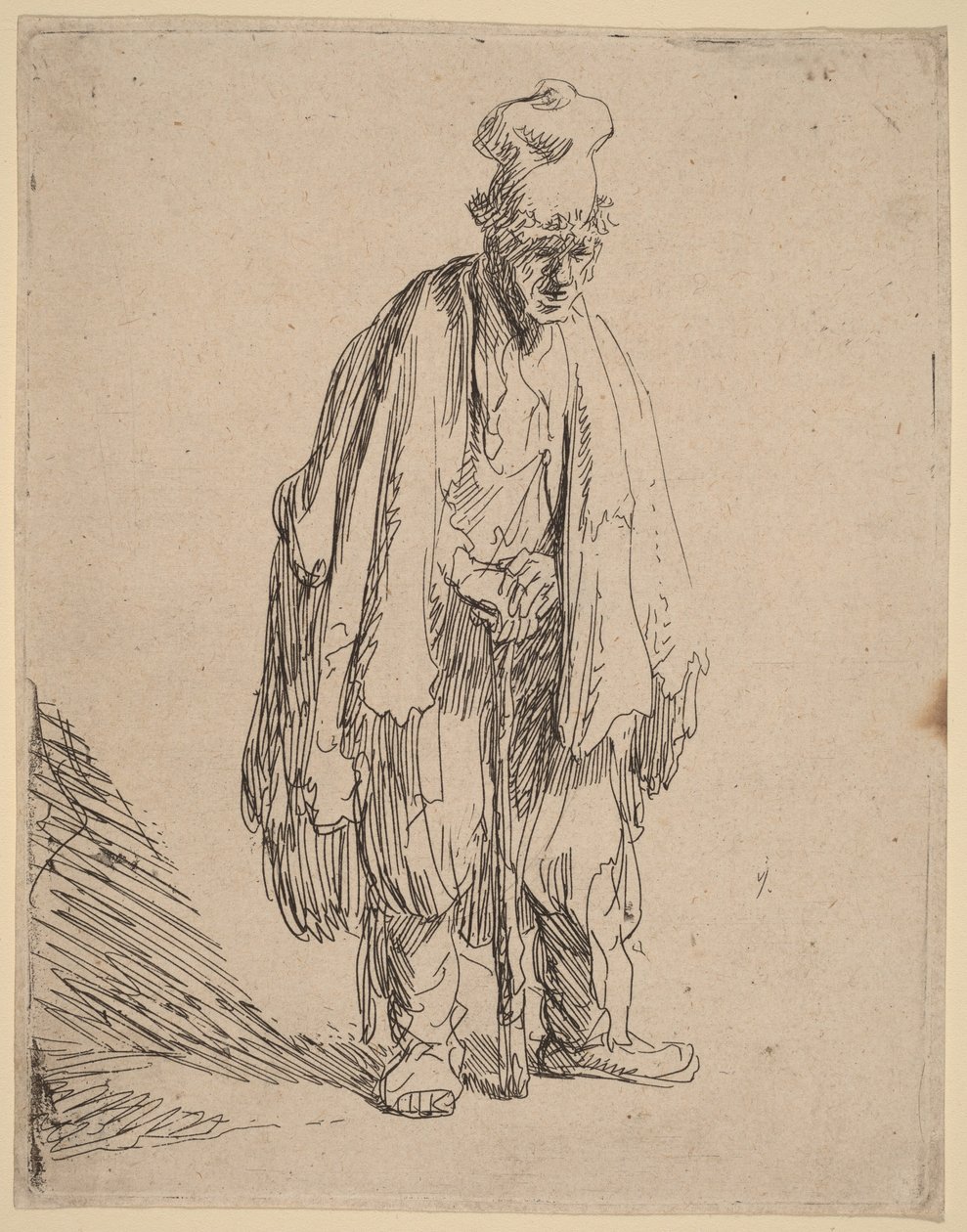 Mendigo con gorra de visera alta, de pie y apoyado en un bastón de Rembrandt van Rijn