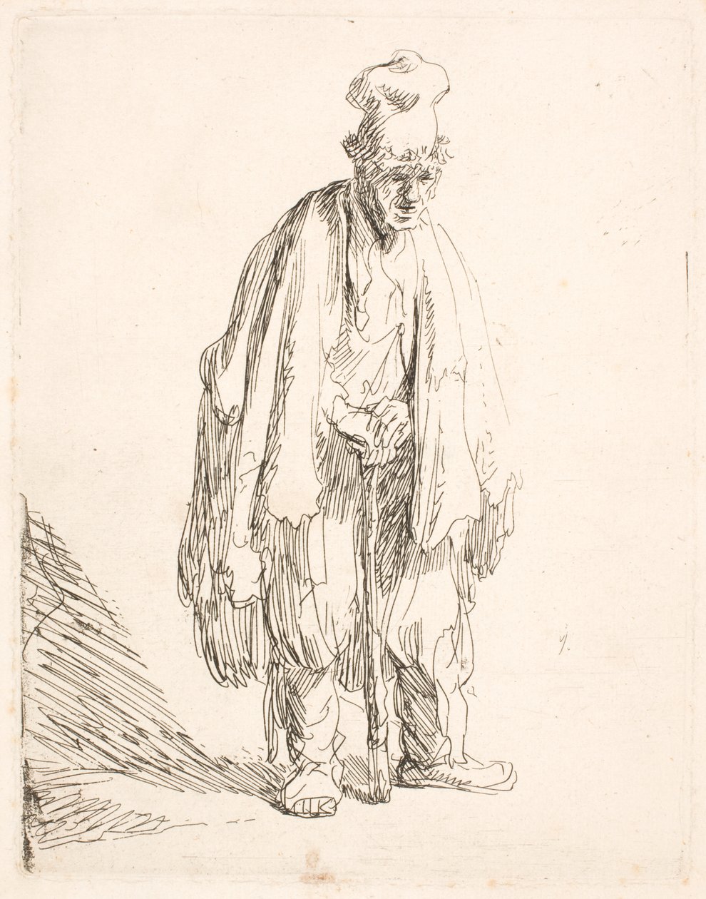 Mendigo con una gorra de visera ancha, de pie y apoyado en un bastón de Rembrandt van Rijn