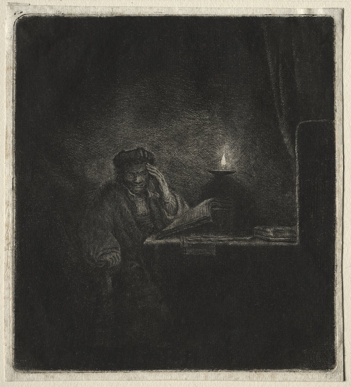 Copia de Estudiante en una mesa a la luz de las velas de Rembrandt van Rijn