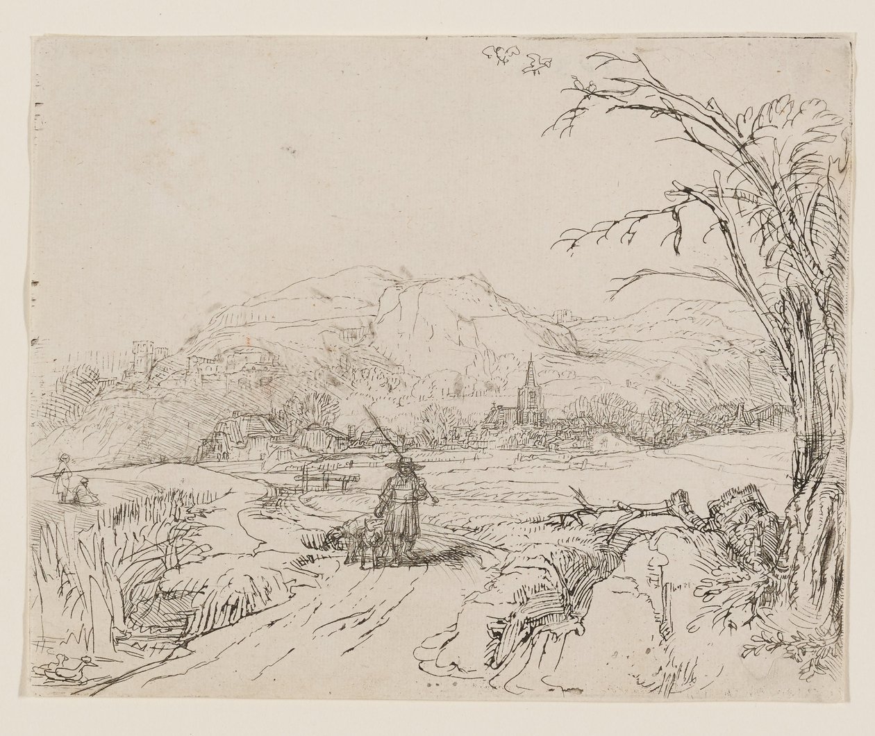 Paisaje con un cazador y perros de Rembrandt van Rijn