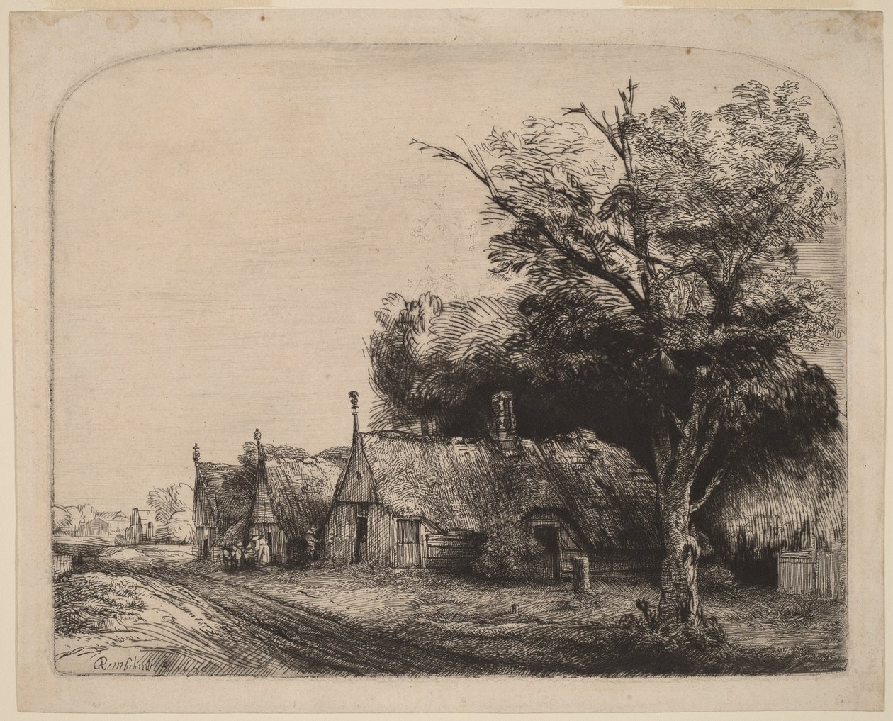Paisaje con tres casitas a dos aguas junto a una carretera de Rembrandt van Rijn